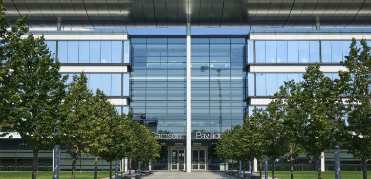 View of Samson Pavilion Entry Doors with tree lined walkway